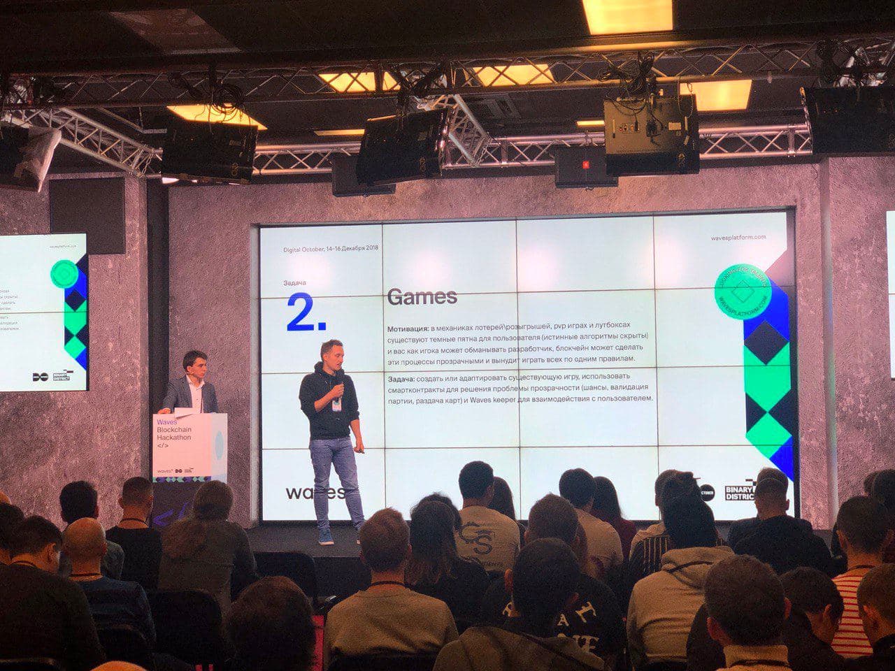 Me standing on stage at Waves hackaton